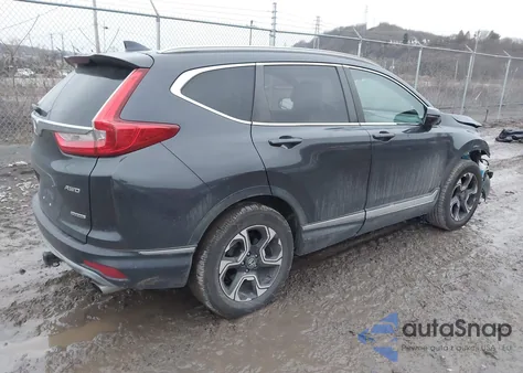 2017 Honda Cr-V Touring z USA, uszkodzony, nr VIN 5J6RW2H98HL032123